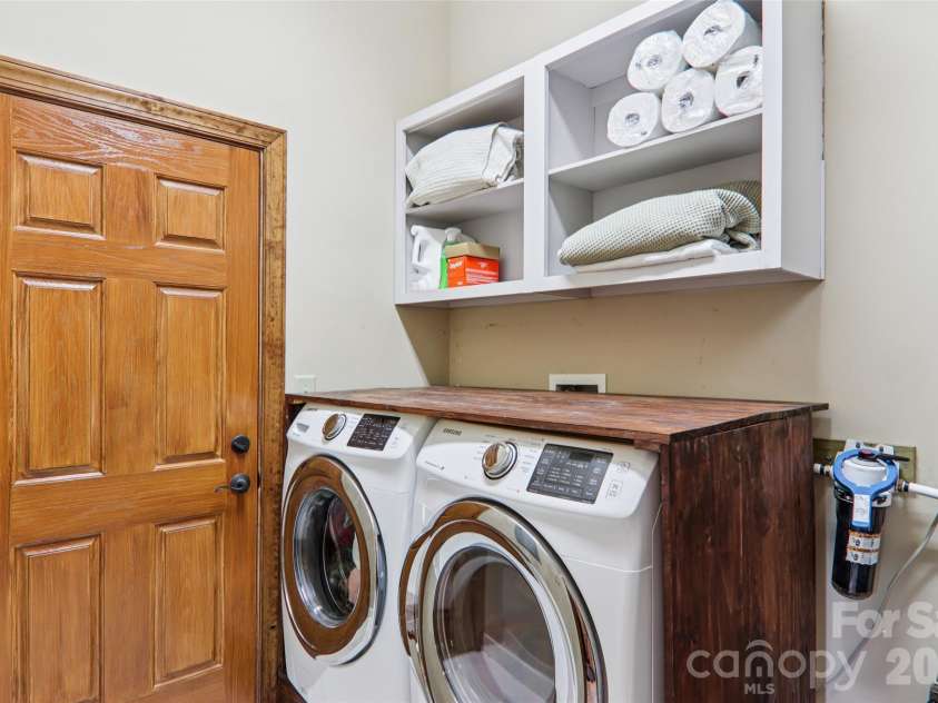 184 Deep Woods Lane, Saluda, NC 28773.  MLS# CAR4333233, YatesRealty ID 12686. Laundry Room