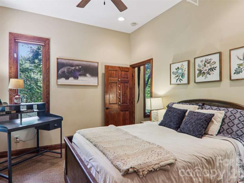 184 Deep Woods Lane, Saluda, NC 28773.  MLS# CAR4333233, YatesRealty ID 12686. Lower level ceilings over 9.5ft Ensuite Features Features Private Deck, PrivateEntrance, Casement Windows, Berber Carpet, Walk-in Shower, Garage Access