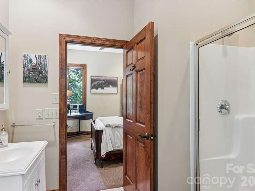 184 Deep Woods Lane, Saluda, NC 28773.  MLS# CAR4333233, YatesRealty ID 12686. Private bathroom for lower level.