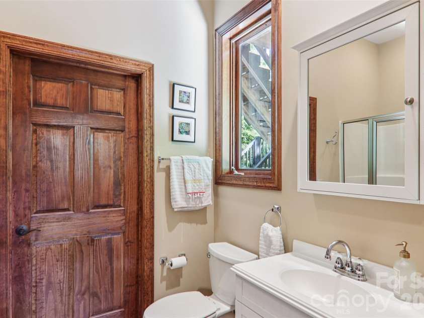 184 Deep Woods Lane, Saluda, NC 28773.  MLS# CAR4333233, YatesRealty ID 12686. Private bathroom for lower level.