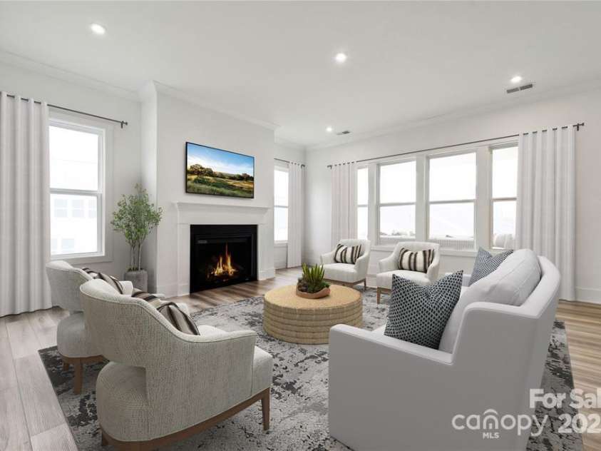 5205 Mint Harbor Way, Charlotte, NC 28269.  MLS# CAR4241159, YatesRealty ID 12686. Tahoma Model Living Room - Not actual home