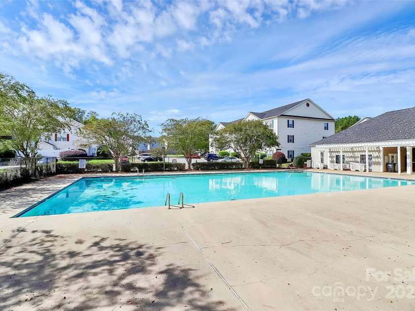 2045 Flushing Court, Charlotte, NC 28215.  MLS# CAR4256375, YatesRealty ID 12689. Community Olympic-sized pool