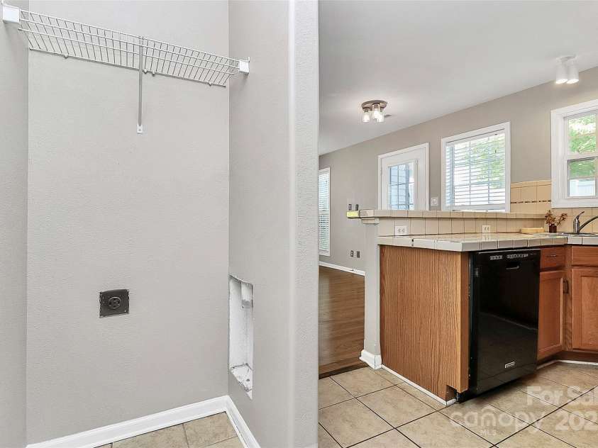2045 Flushing Court, Charlotte, NC 28215.  MLS# CAR4256375, YatesRealty ID 12689. Convenient laundry off kitchen