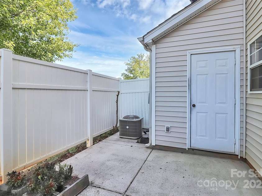 2045 Flushing Court, Charlotte, NC 28215.  MLS# CAR4256375, YatesRealty ID 12689. Fenced patio with storage shed