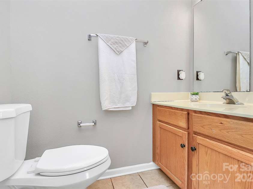 2045 Flushing Court, Charlotte, NC 28215.  MLS# CAR4256375, YatesRealty ID 12689. Half bath downstairs
