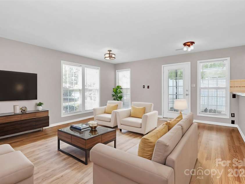 2045 Flushing Court, Charlotte, NC 28215.  MLS# CAR4256375, YatesRealty ID 12689. Living room virtually staged