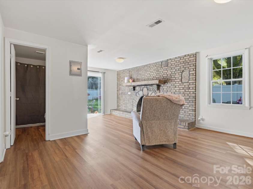 6223 Macon Street, Charlotte, NC 28208.  MLS# CAR4363262, YatesRealty ID 12693. Family room