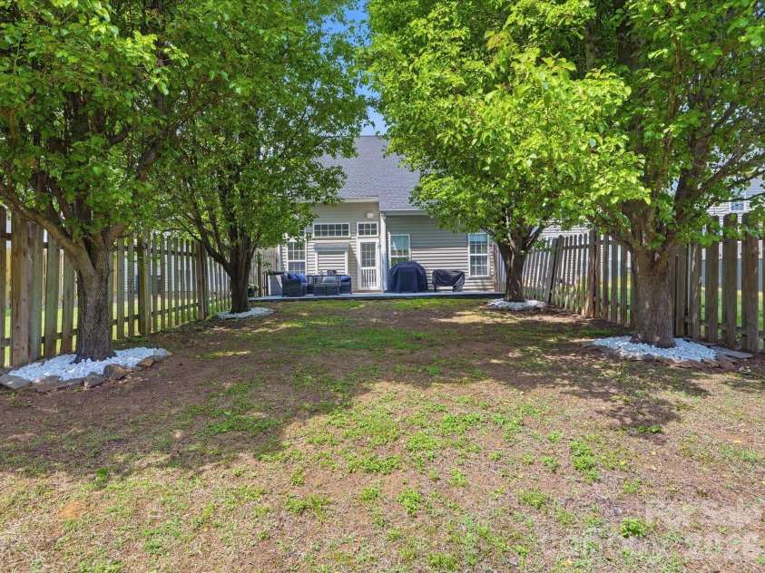 4084 Holly Villa Circle, Indian Trail, NC 28079.  MLS# CAR4365523, YatesRealty ID 12696. Exceptionally Large Rear Lawn
