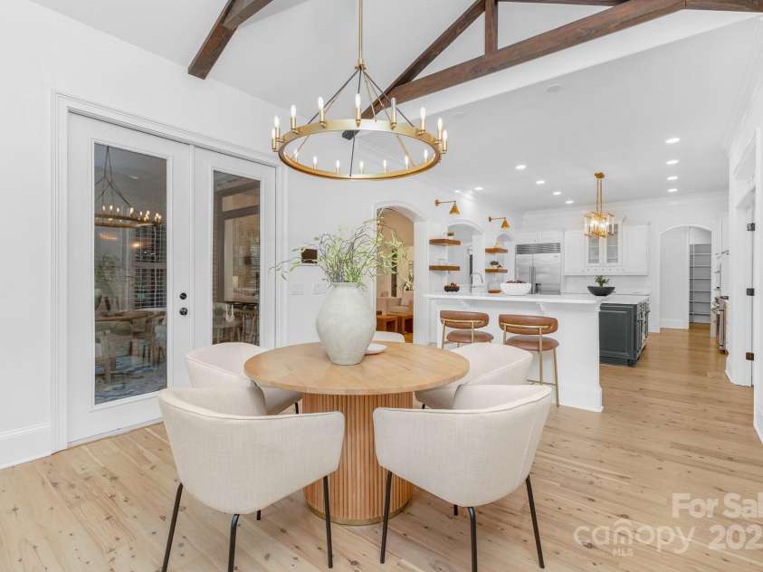 7311 Barrington Ridge Drive, Fort Mill, SC 29707.  MLS# CAR4310703, YatesRealty ID 12696. Breakfast room with access to screened veranda.