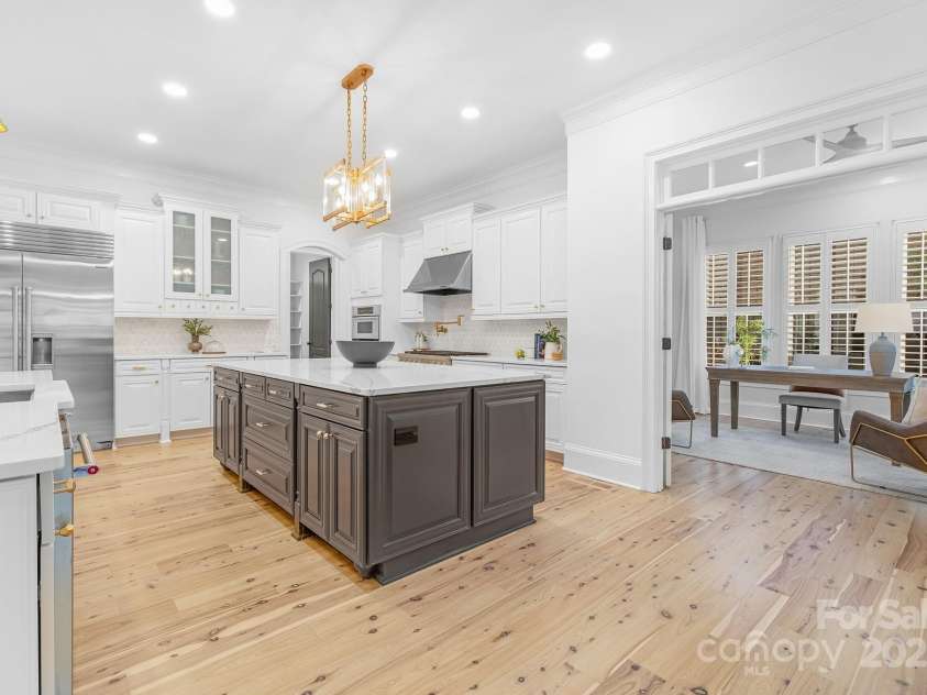 7311 Barrington Ridge Drive, Fort Mill, SC 29707.  MLS# CAR4310703, YatesRealty ID 12696. French doors to sunroom/office/flex room