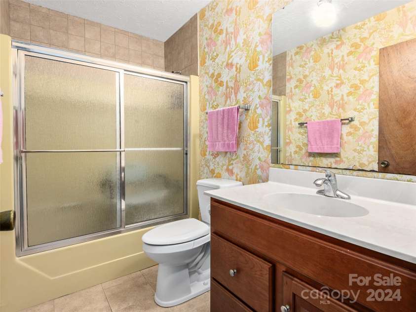 7 Chase Drive, Candler, NC 28715.  MLS# CAR4154891, YatesRealty ID 127. 