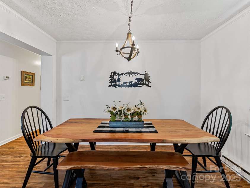 860 Creekside Drive, Maggie Valley, NC 28751.  MLS# CAR4245544, YatesRealty ID 12700. Dining area off of the kitchen.