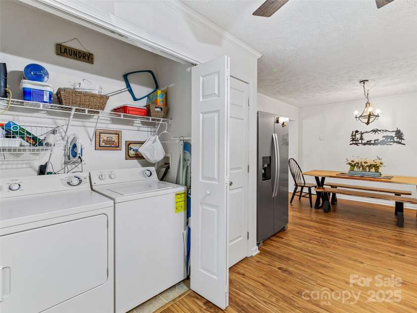 860 Creekside Drive, Maggie Valley, NC 28751.  MLS# CAR4245544, YatesRealty ID 12700. Laundry closet off of the kitchen.