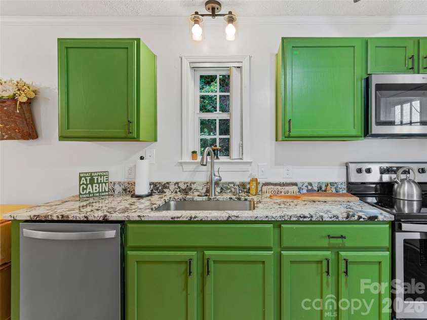 860 Creekside Drive, Maggie Valley, NC 28751.  MLS# CAR4329432, YatesRealty ID 12700. 