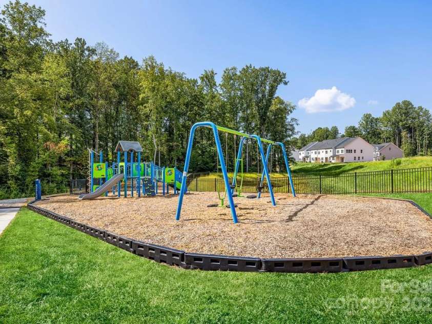 9408 Munsing Drive, Charlotte, NC 28269.  MLS# CAR4235913, YatesRealty ID 12701. Lots of fun on the Community playground!