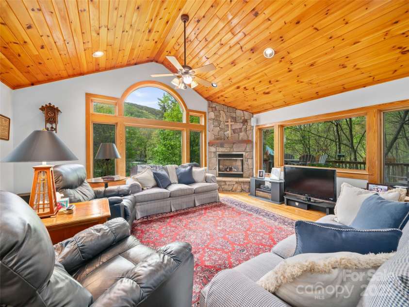 86 Laurel Drive, Burnsville, NC 28714.  MLS# CAR4253522, YatesRealty ID 12702. Beautiful wood on flooring and ceilings of great room, dining area and kitchen and most rooms 