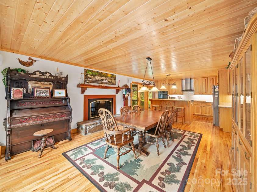 86 Laurel Drive, Burnsville, NC 28714.  MLS# CAR4253522, YatesRealty ID 12702. Dining area off Kichen 