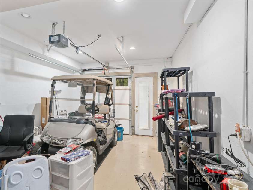 86 Laurel Drive, Burnsville, NC 28714.  MLS# CAR4253522, YatesRealty ID 12702. Golf Cart or small vehicle  Garage on Basement level 