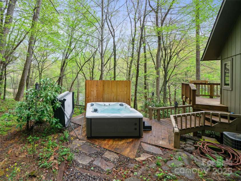 86 Laurel Drive, Burnsville, NC 28714.  MLS# CAR4253522, YatesRealty ID 12702. Hot tub with privacy Wall 