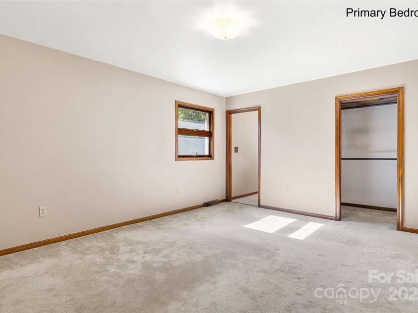 5303 Rogers Road, Monroe, NC 28110.  MLS# CAR4312504, YatesRealty ID 12706. Primary bedroom