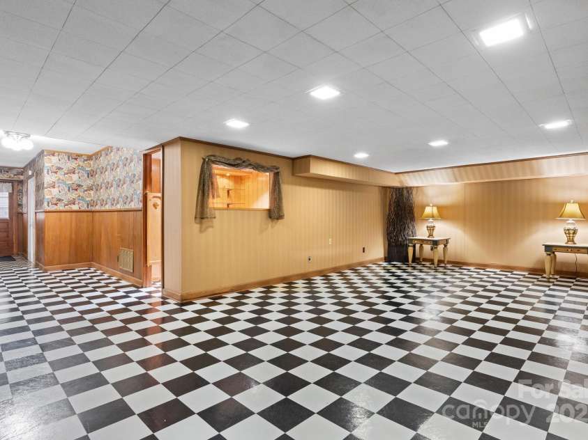 114 Eastwood Park Drive, Lenoir, NC 28645.  MLS# CAR4252137, YatesRealty ID 12710. Basement Den w/Gas Logs & Bar for Entertaining!