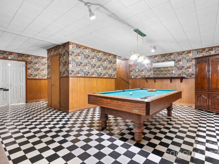 114 Eastwood Park Drive, Lenoir, NC 28645.  MLS# CAR4252137, YatesRealty ID 12710. Basement Game Room