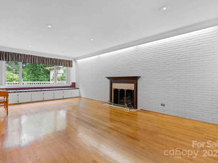 114 Eastwood Park Drive, Lenoir, NC 28645.  MLS# CAR4252137, YatesRealty ID 12710. Large Living Room w/Gas Logs, Picture Window & Storage