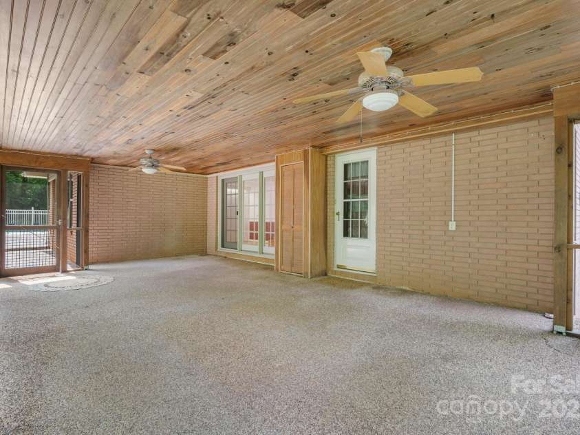 114 Eastwood Park Drive, Lenoir, NC 28645.  MLS# CAR4252137, YatesRealty ID 12710. Large Screened Porch Offers a Private Oasis!