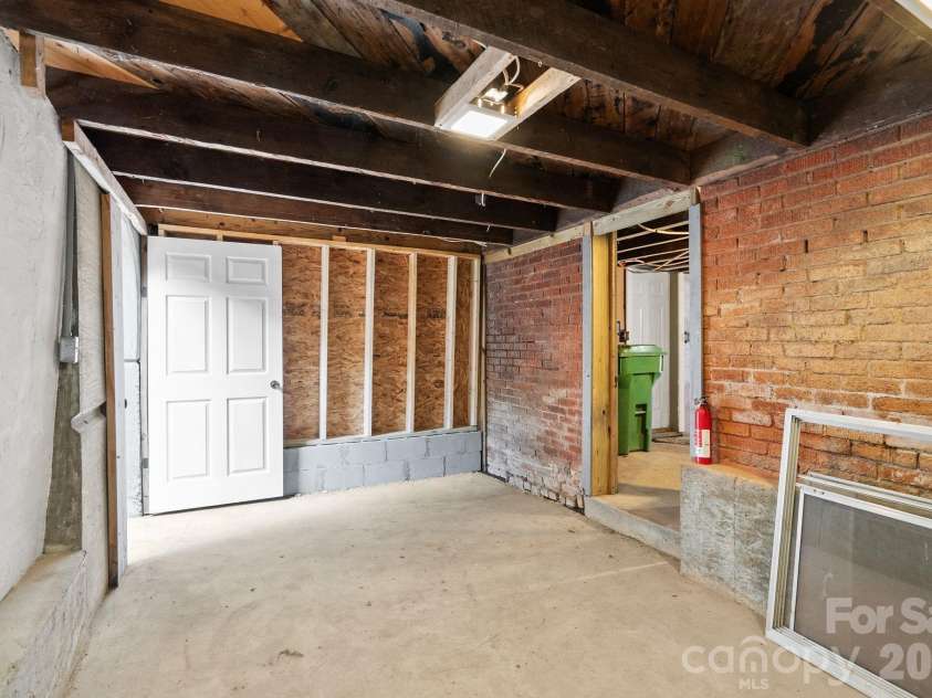 15 Conestee Place, Asheville, NC 28801.  MLS# CAR4358029, YatesRealty ID 12711. So much dry storage available in the basement!