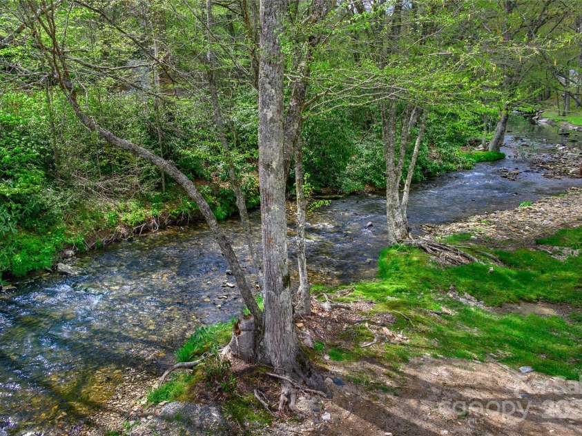 139 Beaver Lodge Trail, Blowing Rock, NC 28605.  MLS# CAR4257022, YatesRealty ID 12712. Trout stocked Creek