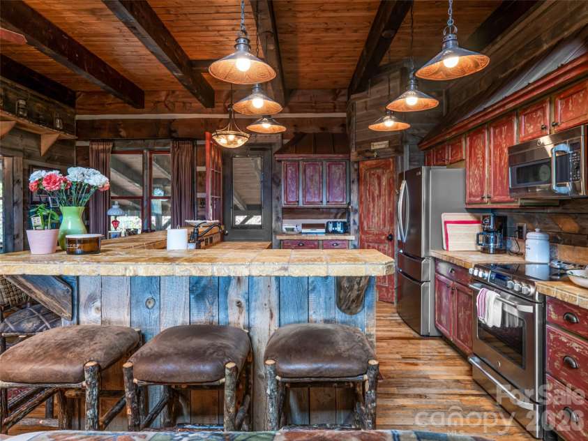 234 Historic Oak Trail, Waynesville, NC 28785.  MLS# CAR4309308, YatesRealty ID 12716. This kitchen has charm and functionality - truly unique with bells and whistles.
