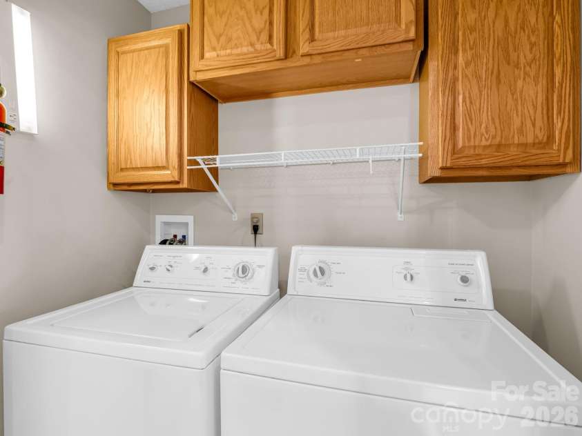 51 Barn Owl Way, Hendersonville, NC 28792.  MLS# CAR4394410, YatesRealty ID 12718. Hall Laundry Area
