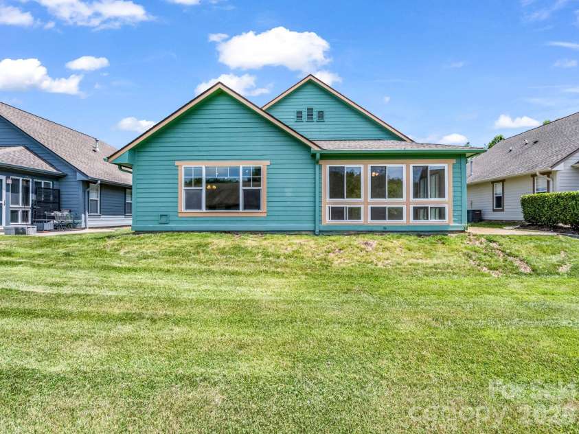 51 Barn Owl Way, Hendersonville, NC 28792.  MLS# CAR4394410, YatesRealty ID 12718. Large Greenway Behind Home