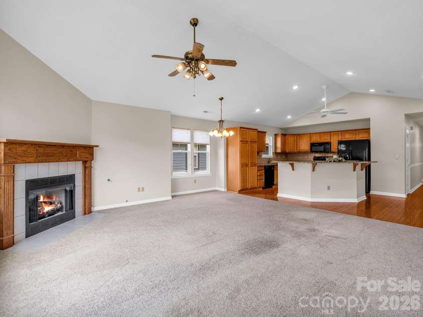 51 Barn Owl Way, Hendersonville, NC 28792.  MLS# CAR4394410, YatesRealty ID 12718. Open Living/Dining/Kitchen w/Vaulted Ceilings