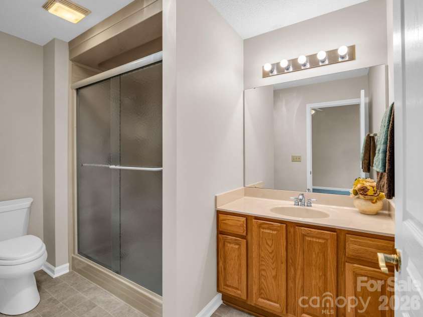 51 Barn Owl Way, Hendersonville, NC 28792.  MLS# CAR4394410, YatesRealty ID 12718. Primary Bath w/Updated Shower