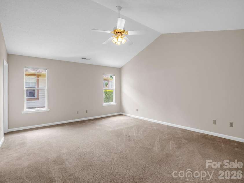 51 Barn Owl Way, Hendersonville, NC 28792.  MLS# CAR4394410, YatesRealty ID 12718. Spacious Primary Bedroom w/Vaulted Ceilings