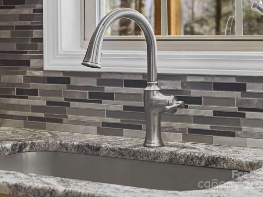 165 Eagles Ridge Road, Sylva, NC 28779.  MLS# CAR4330472, YatesRealty ID 1272. 