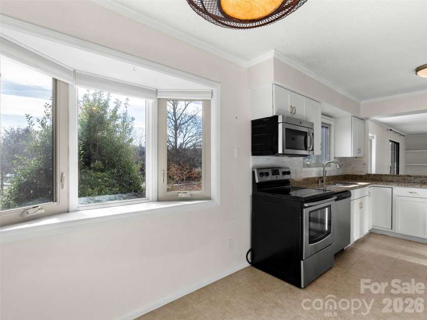 201 Racquet Club Road, Asheville, NC 28803.  MLS# CAR4341796, YatesRealty ID 12720. 