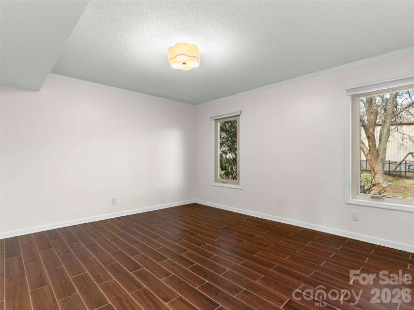 201 Racquet Club Road, Asheville, NC 28803.  MLS# CAR4341796, YatesRealty ID 12720. Spacious Primary Bedroom
