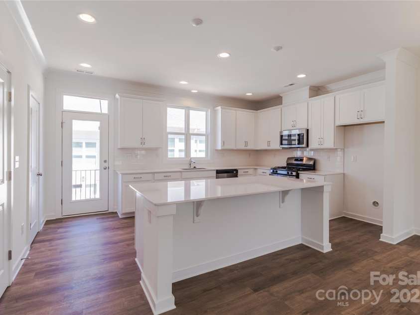 222 Gilead Road, Huntersville, NC 28078.  MLS# CAR4180177, YatesRealty ID 12722. Bright and airy kitchen