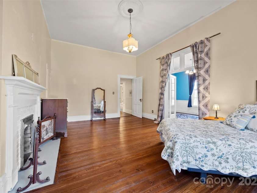 121 Congress Street, York, SC 29745.  MLS# CAR4235428, YatesRealty ID 12723. BPrimary Bedroom RetreatLight pours into this inviting space, showcasing tall ceilings, period details, and timeless style.