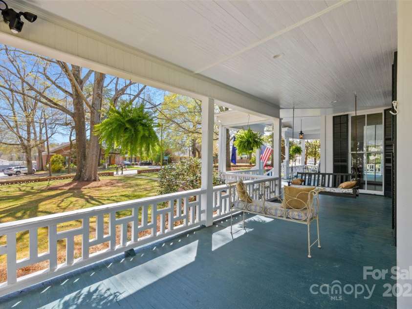 121 Congress Street, York, SC 29745.  MLS# CAR4235428, YatesRealty ID 12723. Classic Southern charm meets comfort with this dreamy swing porch surrounded by mature trees and manicured grounds