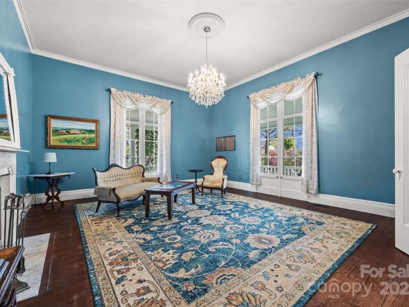 121 Congress Street, York, SC 29745.  MLS# CAR4235428, YatesRealty ID 12723. Former Palor room-Elegant and inviting, the formal living room features tall ceilings, rich color, and original fireplace accents.