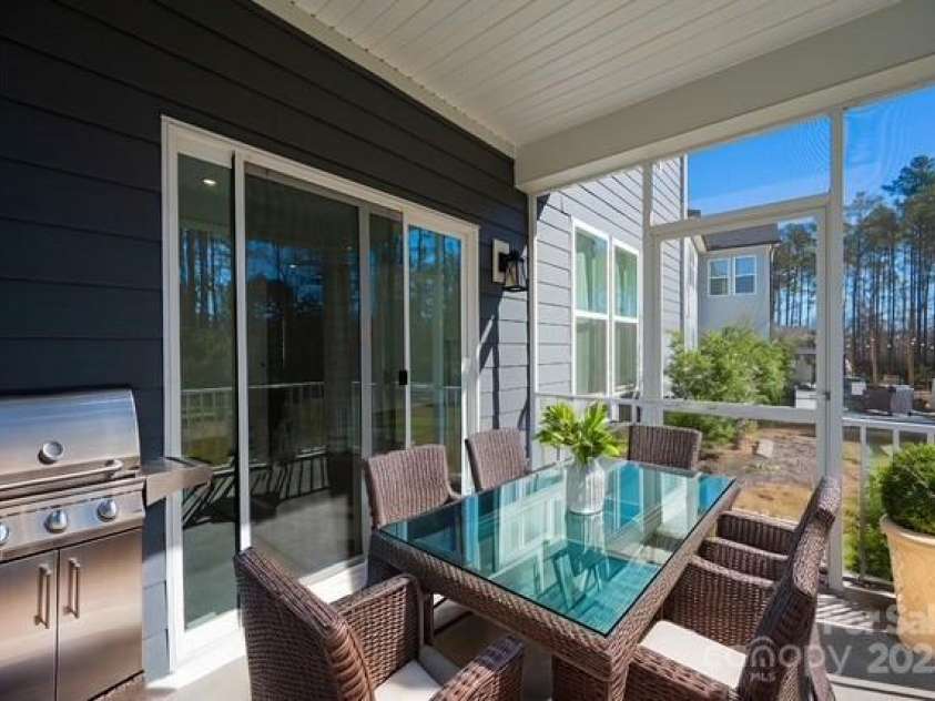 1540 Striped Bass Lane, Clover, SC 29710.  MLS# CAR4254248, YatesRealty ID 12724. Virtual Staging of the Screened In Porch