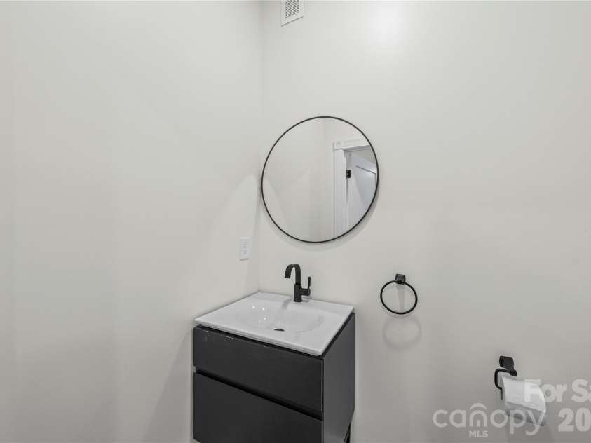 129 Corban Avenue, Concord, NC 28025.  MLS# CAR4357891, YatesRealty ID 12728. Powder room on Main Level
