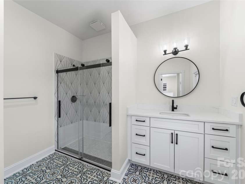 129 Corban Avenue, Concord, NC 28025.  MLS# CAR4357891, YatesRealty ID 12728. Upstairs Bathroom