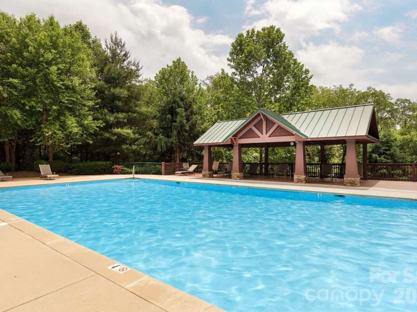 501 Fox Den Court, Hendersonville, NC 28792.  MLS# CAR4361980, YatesRealty ID 12730. Heated community pool