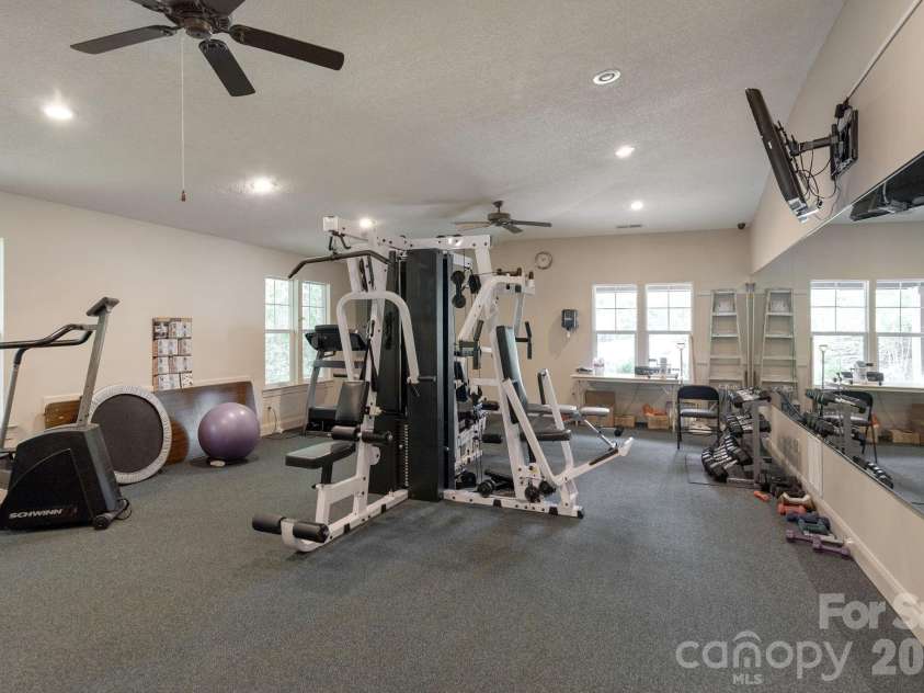 501 Fox Den Court, Hendersonville, NC 28792.  MLS# CAR4361980, YatesRealty ID 12730. Workout area