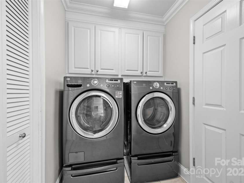 6424 Chadwell Court, Fort Mill, SC 29707.  MLS# CAR4255139, YatesRealty ID 12730. Large Laundry with Storage