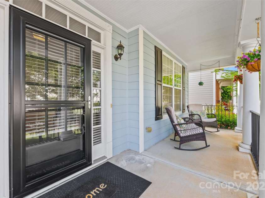 6424 Chadwell Court, Fort Mill, SC 29707.  MLS# CAR4255139, YatesRealty ID 12730. Rocking chair Front Porch.